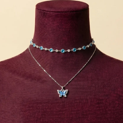 Papillon Azur — Collier Double Rang Cristaux Bleus Pendentif Papillon | Auraya